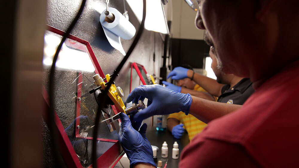 A group undergoing Windshield Repair Training in a class environment.